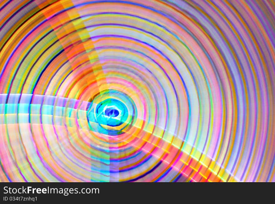 Abstract rainbow colored background in the shape of circles. Abstract rainbow colored background in the shape of circles