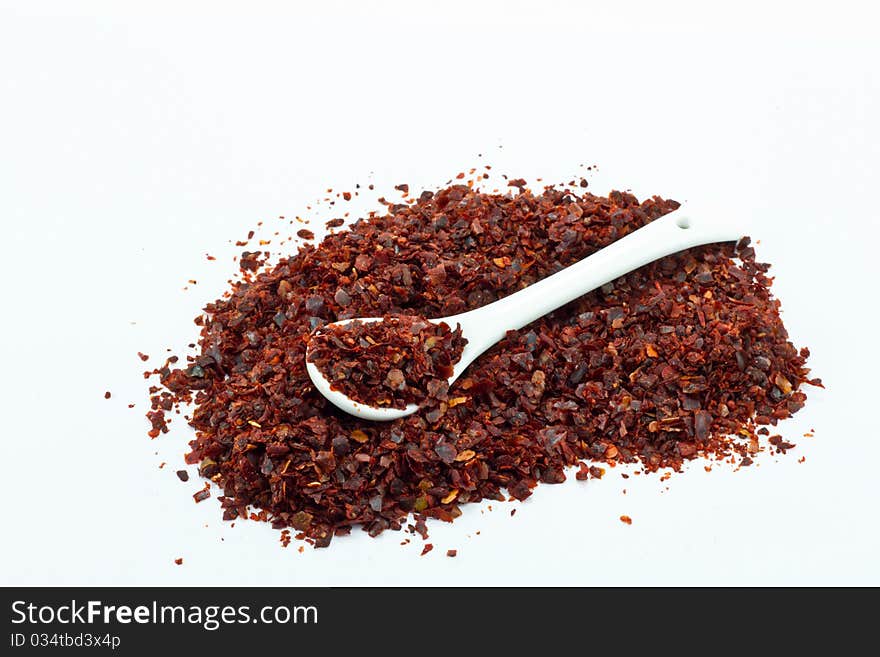 Pile of Hot Red Chilli pepper with spoon