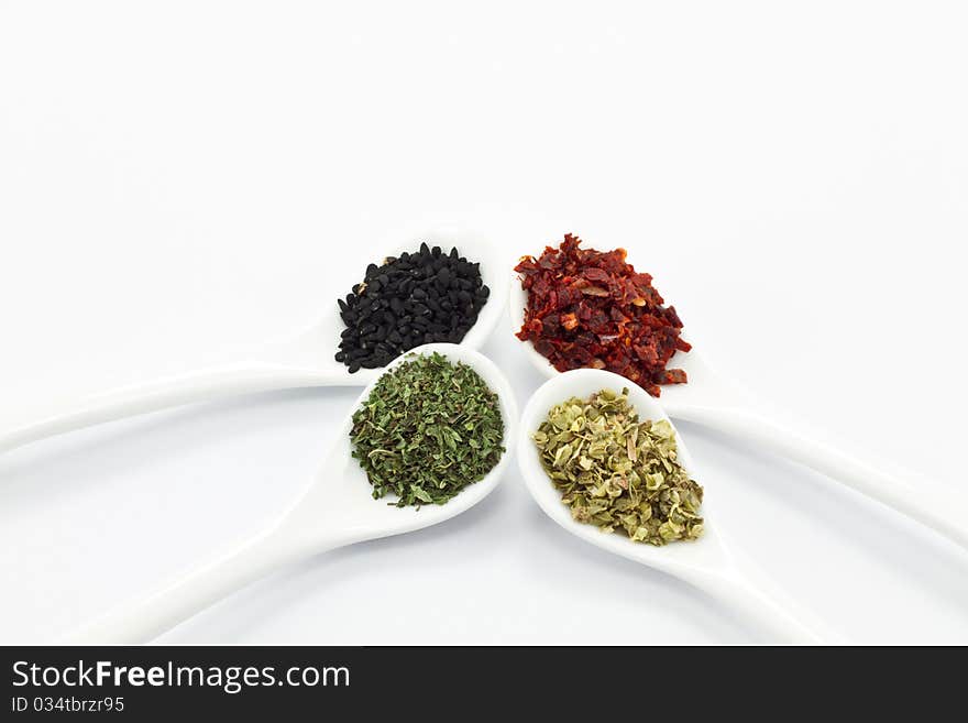 Various spices isolated on white