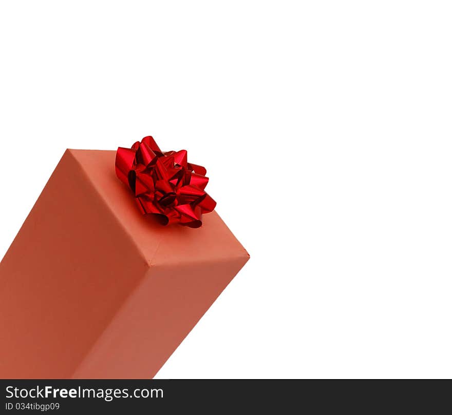 Close up of gift box with red bow isolated on white background. Close up of gift box with red bow isolated on white background.