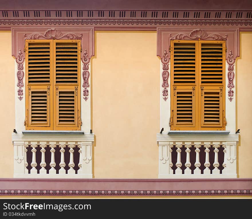 Decorated window on the facade of a building in the village of Camogli. Decorated window on the facade of a building in the village of Camogli