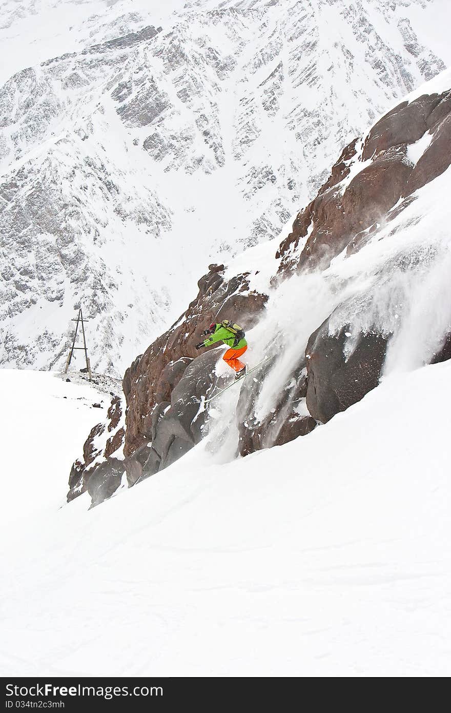 Freerider jumping in Caucasus mountains