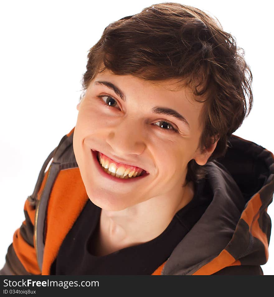 Happy young man looking up and smiling on white background