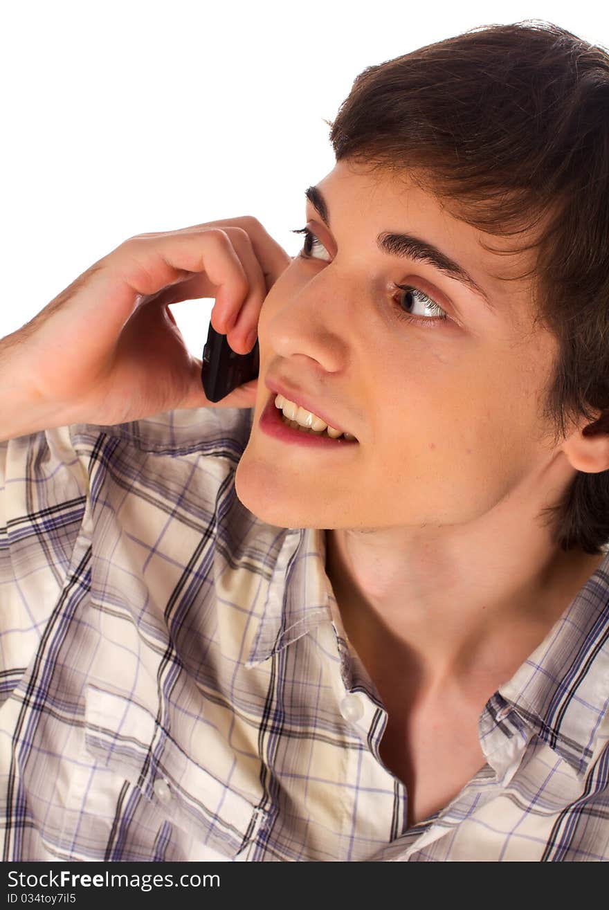 Young man talking mobile phone on white background