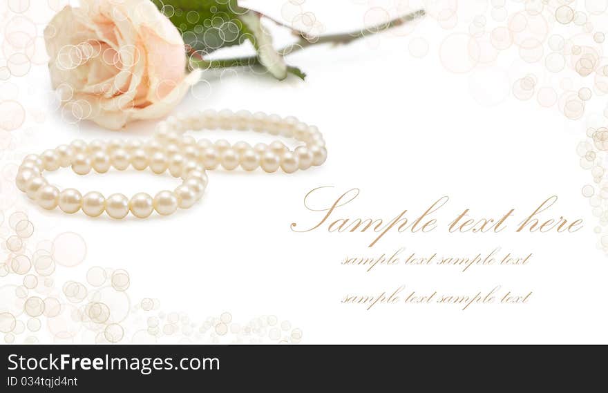 Greeting card with pearls and rose