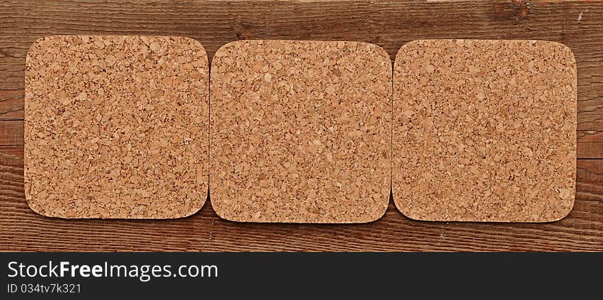 Cork texture on wood background