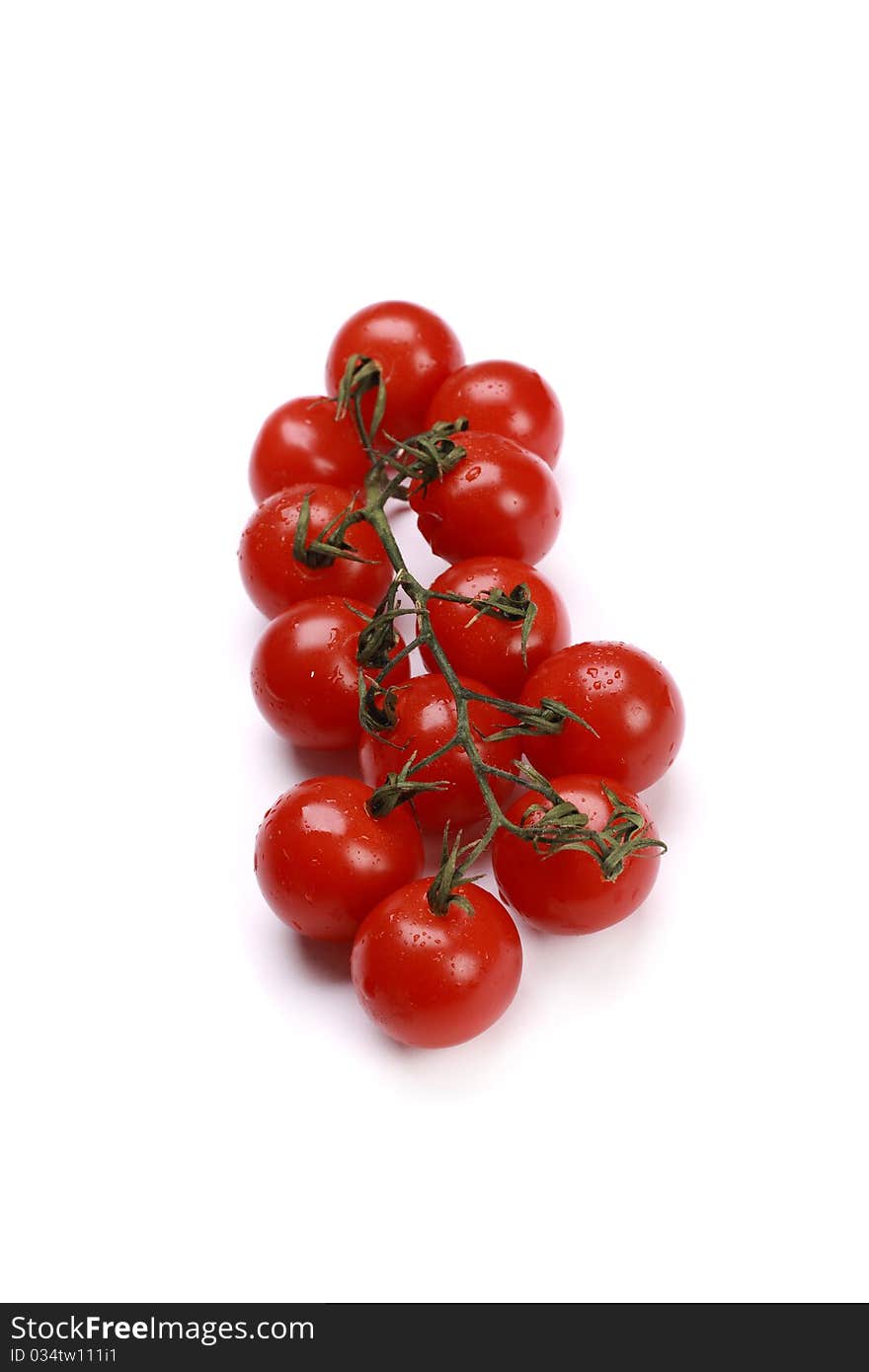 Cherry tomatoes isolated on white background