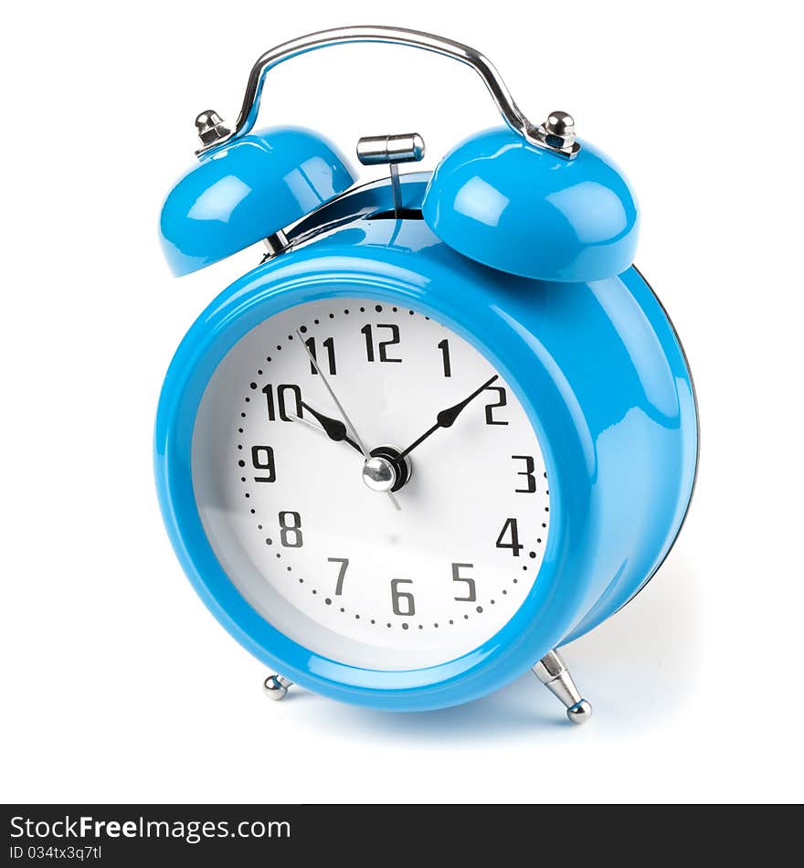 Old Fashioned blue mechanical alarm clock on white background