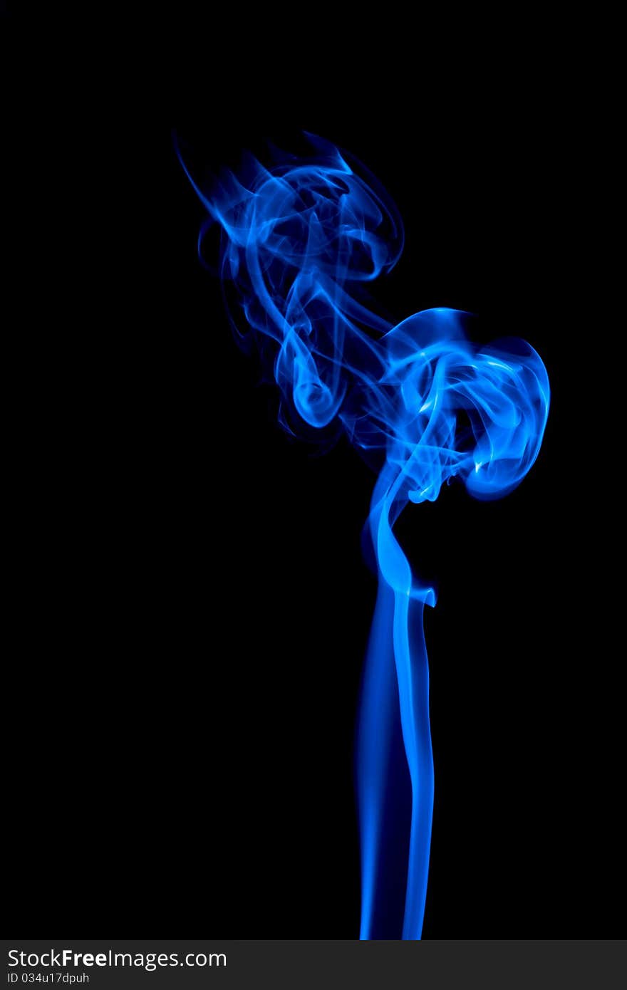 Blue smoke on black background - Unmodified only mirrored hue adjusted. Blue smoke on black background - Unmodified only mirrored hue adjusted.