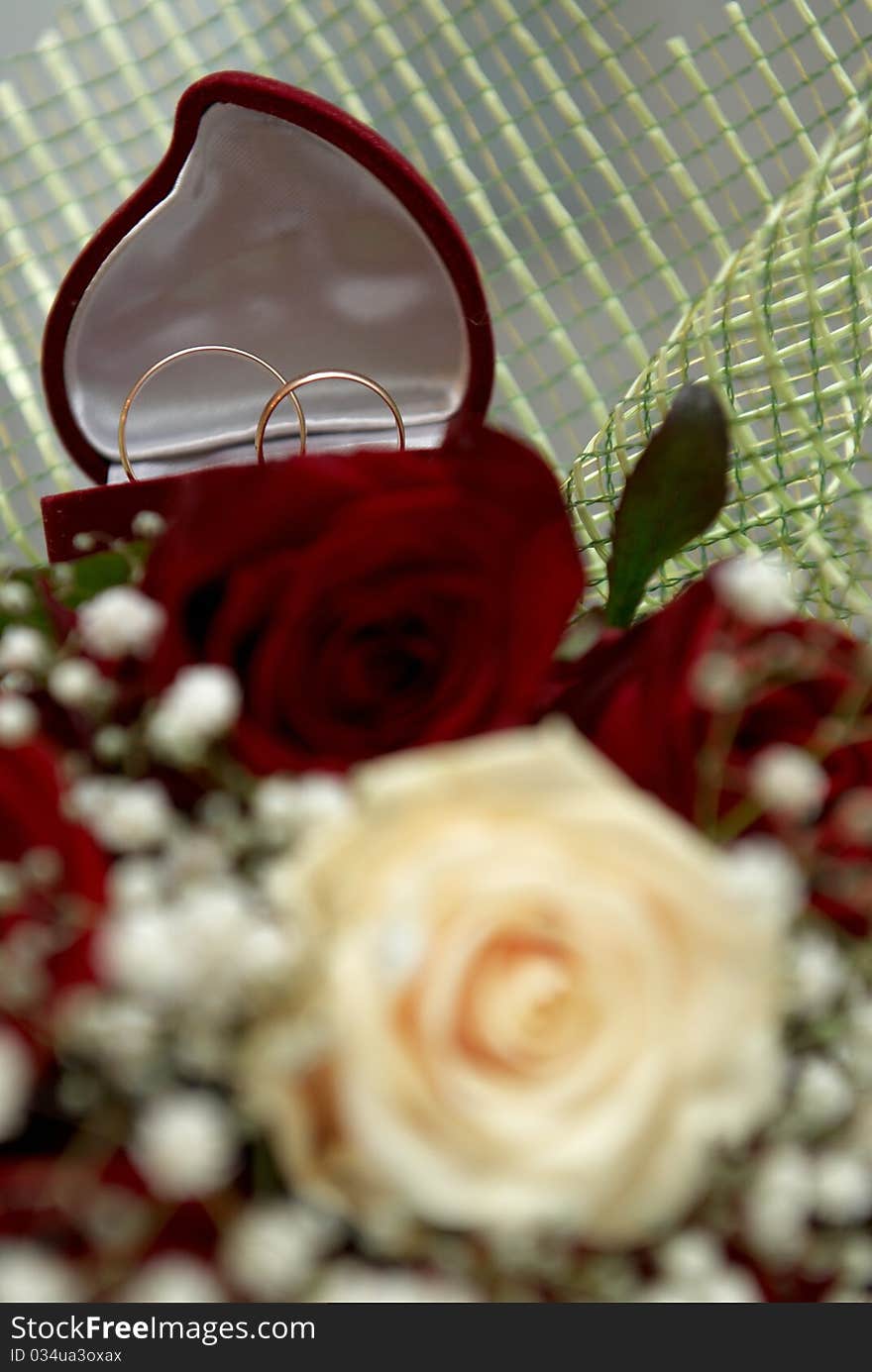 Wedding rings on bouquet