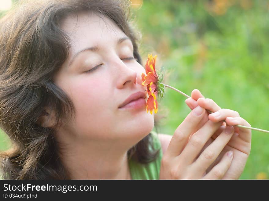 A young woman and flower