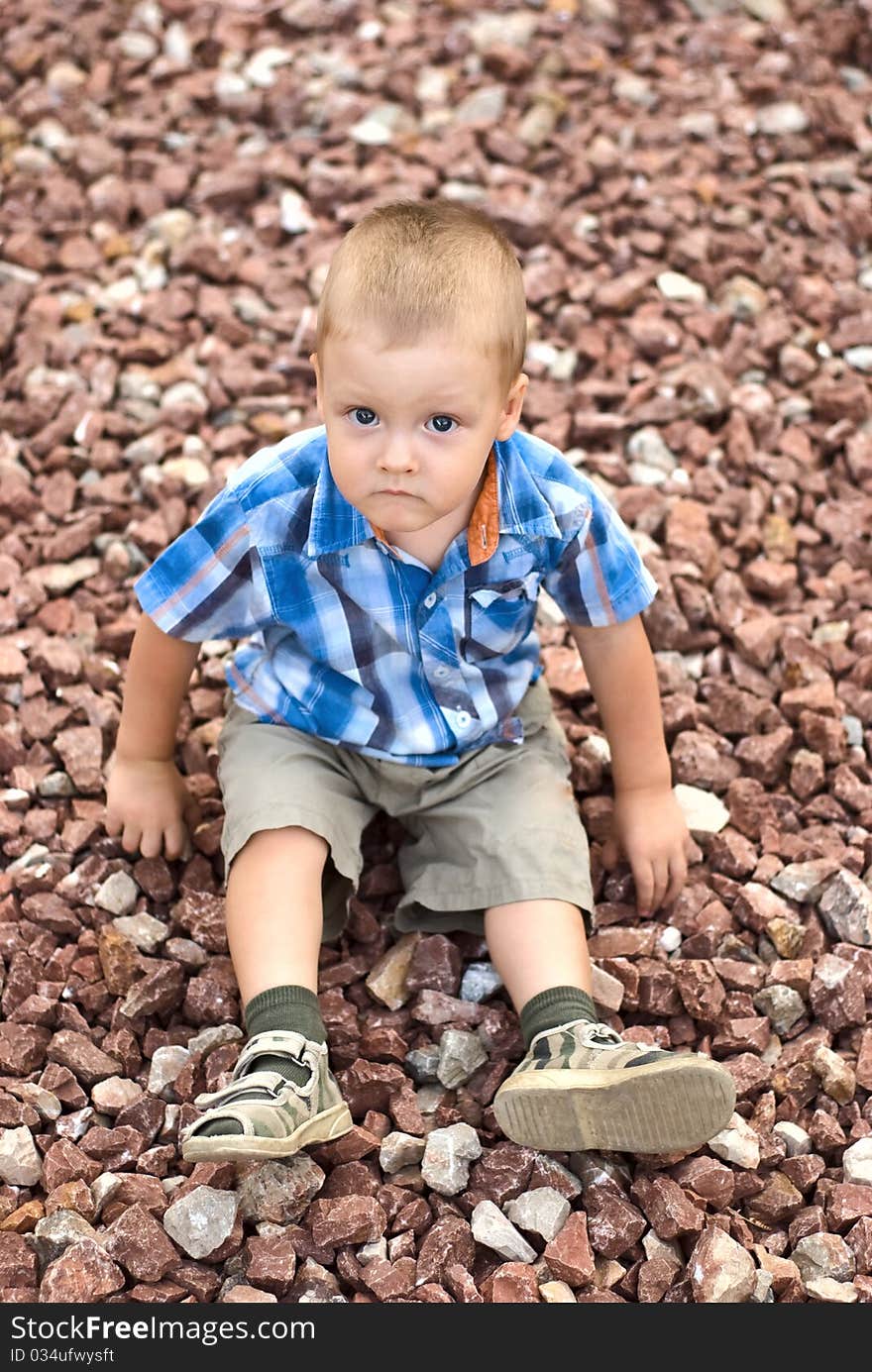 A boy on stones