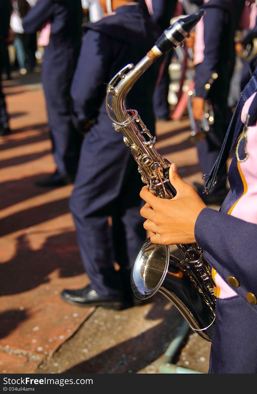 Man play saxophone musical instrument