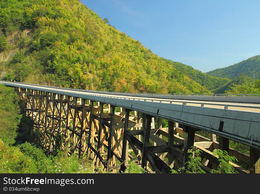 Bridge, mountain and blue sky. Bridge, mountain and blue sky