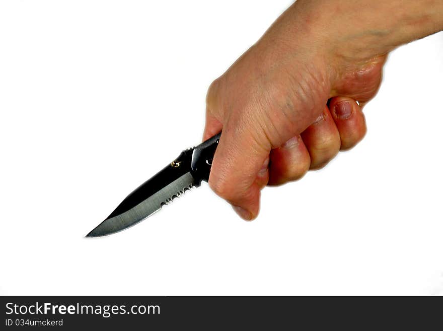 Knife in the hand isolated over white