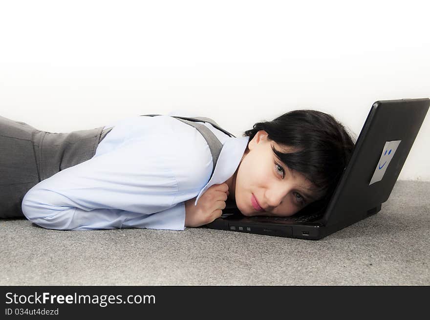 Beautiful Brunette Girl Resting on Computer