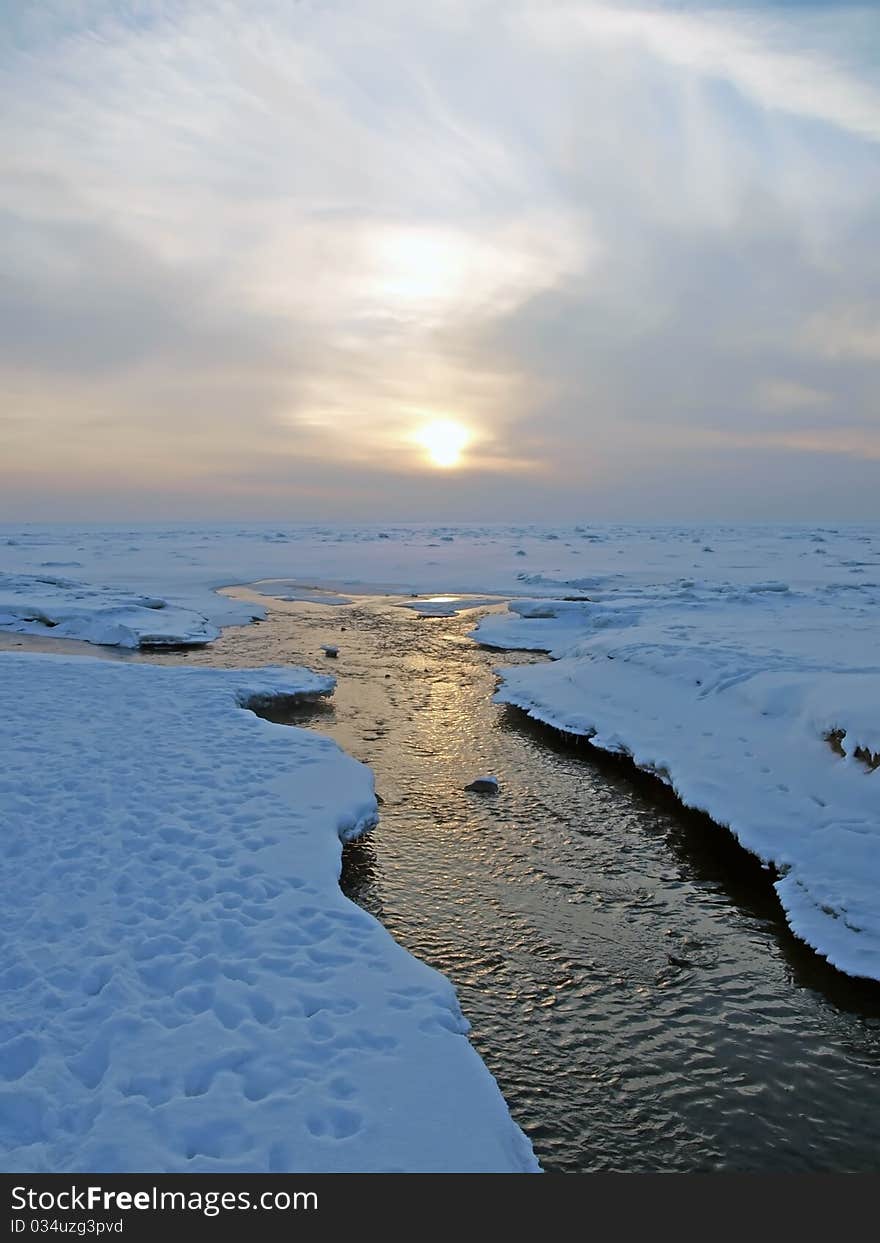 Non-freezing river fall into the lake