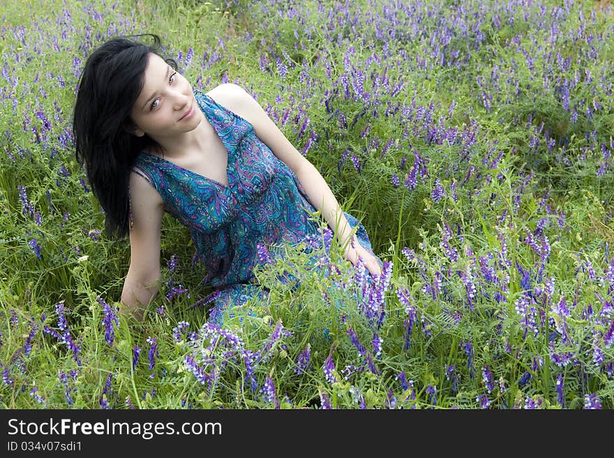 Beautiful Black Hair Girl in blue flowers