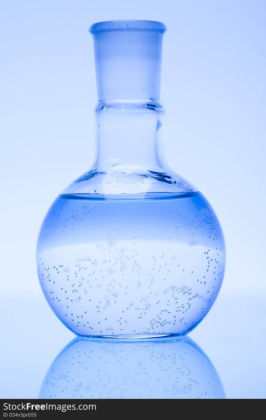 Laboratory glass. Glassware on the blue background.