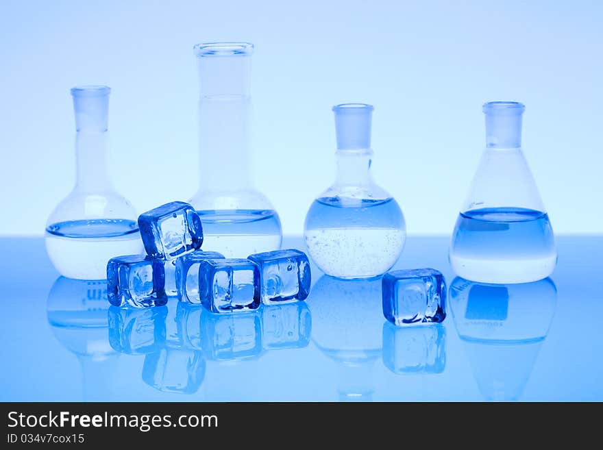 Laboratory glass. Glassware on the blue background.