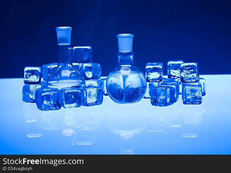 Laboratory glass. Glassware on the blue background.