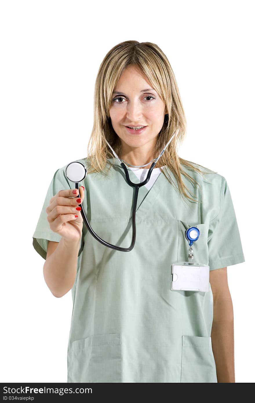 Smiling confident medical staff standing in her uniform. Smiling confident medical staff standing in her uniform