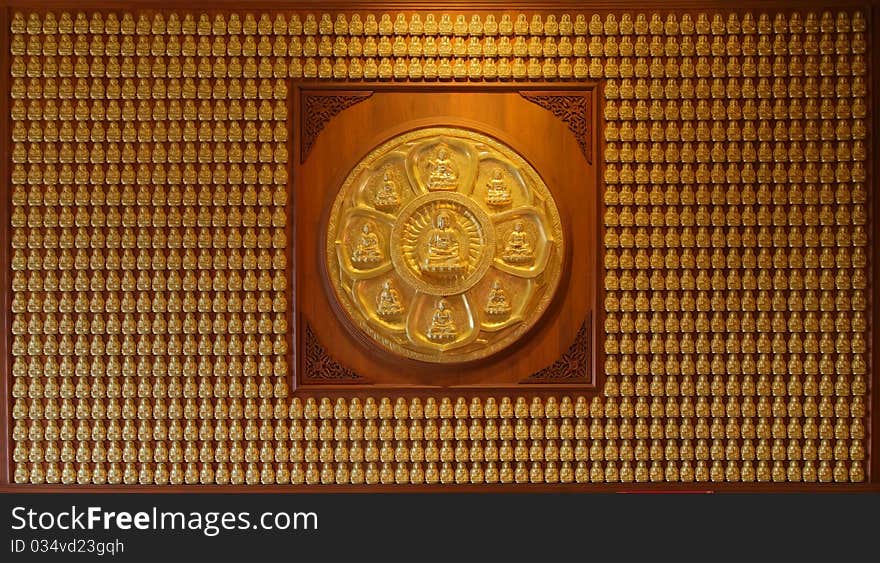 Image of golden Buddha in Chinese temple wall. Image of golden Buddha in Chinese temple wall