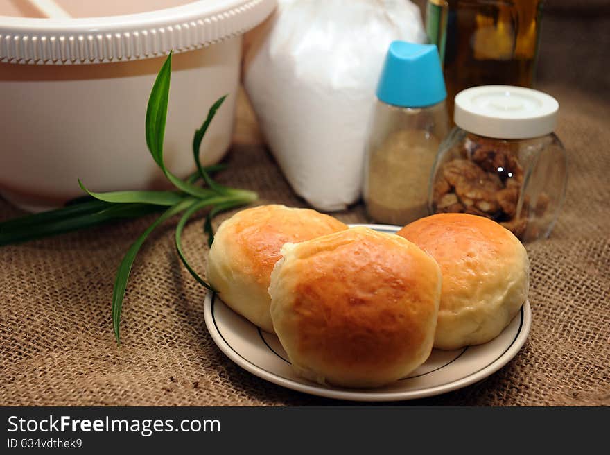 Close Up of a stack of freshly baked homemade buns. Close Up of a stack of freshly baked homemade buns.