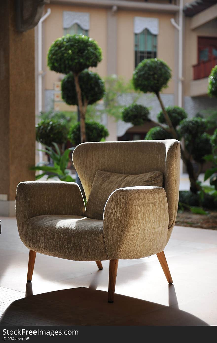 A relaxation corner in hotel,with comfortable chair. A relaxation corner in hotel,with comfortable chair.