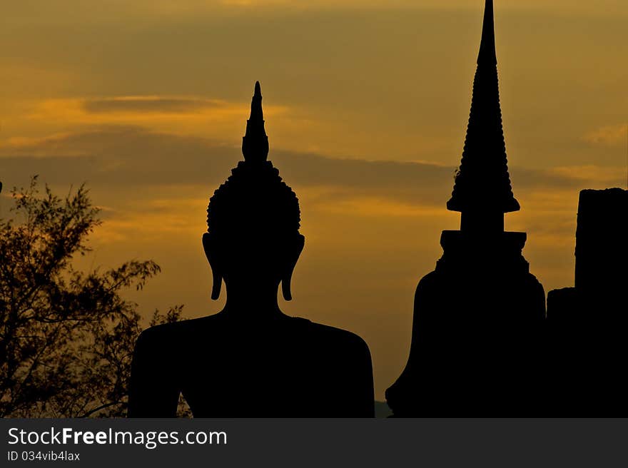 Silhouette of buddha statue