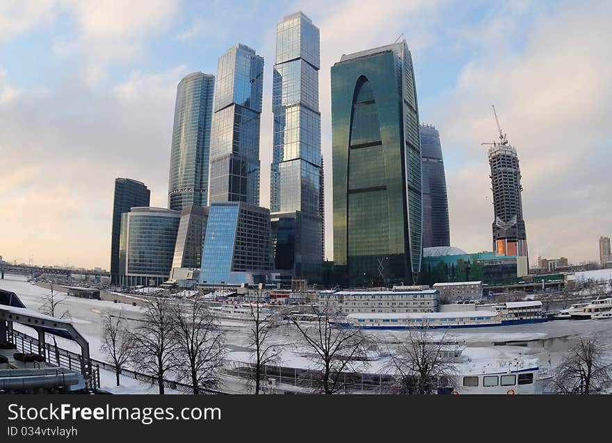 Citycsape with skyscrapers on a winter evening. Citycsape with skyscrapers on a winter evening