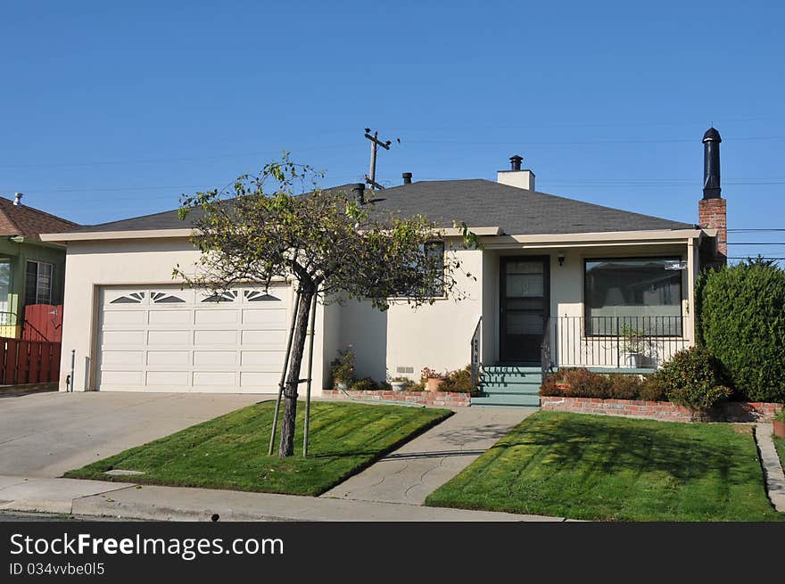 House surrounded by trees and grass