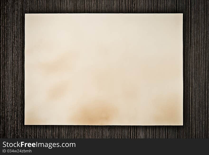 Grunge old paper on wood background. Grunge old paper on wood background