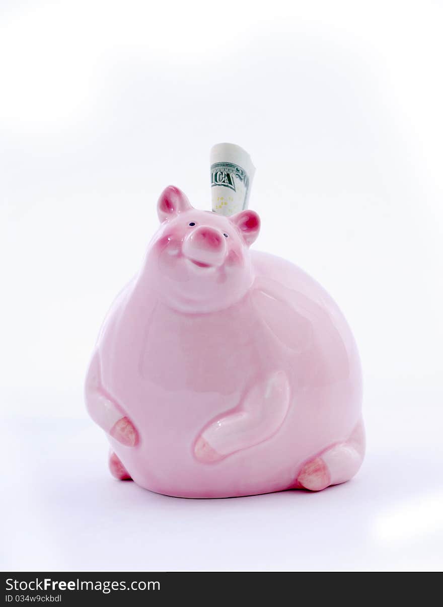 Piggy bank with dollars.