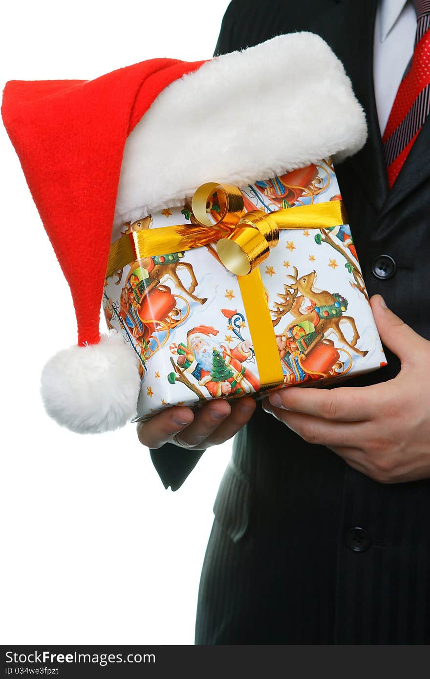 The businessman in a black suit has control over a celebratory gift. The businessman in a black suit has control over a celebratory gift