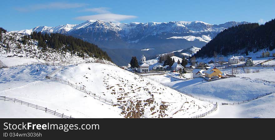 Mountain village on winter in Carpathian Mountains (Romania)-Fundatica. Mountain village on winter in Carpathian Mountains (Romania)-Fundatica.