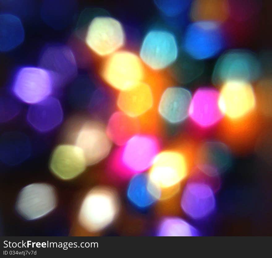 Abstract lights shining in city in different colors