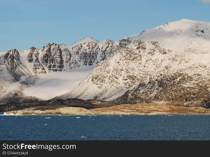 Snow And Sea In Svalbard Islands