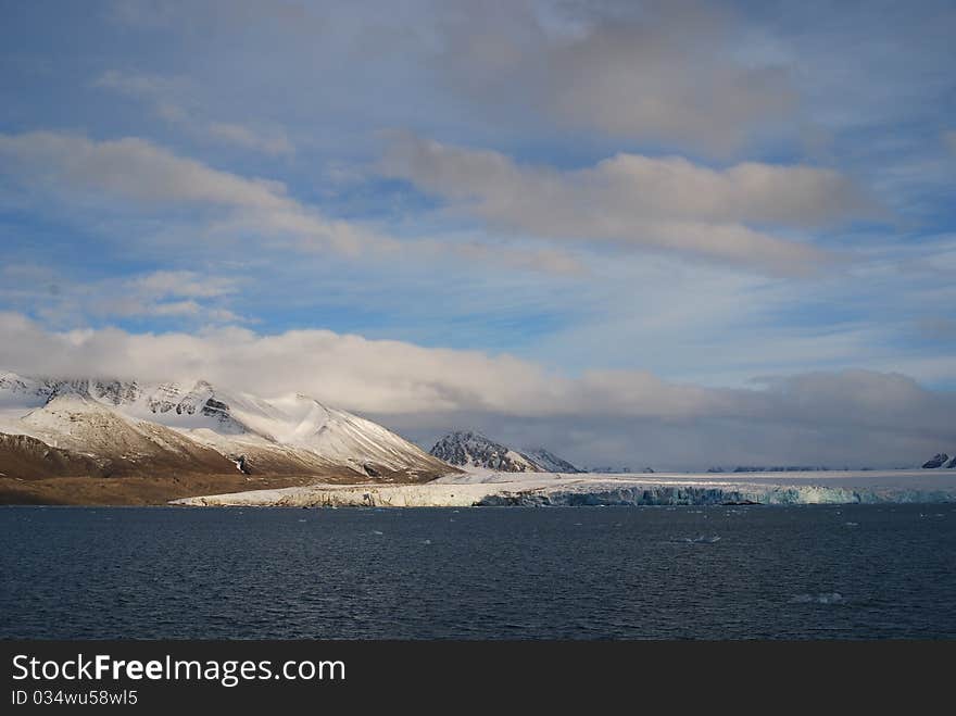 Snow and sea in svalbard islands