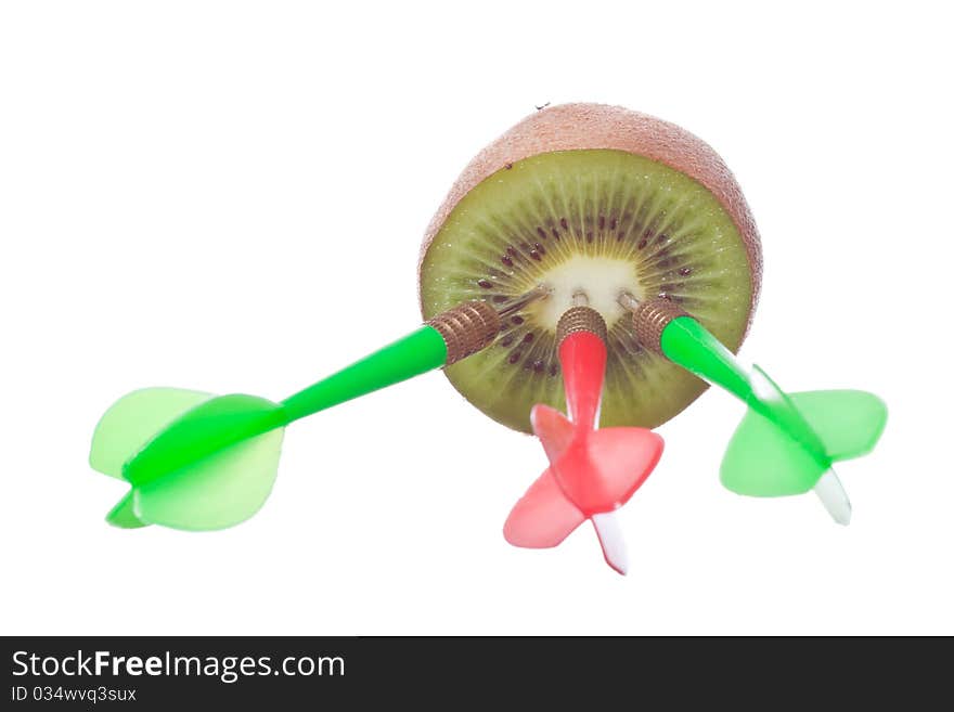 Three darts hit kiwi on white isolated background. Three darts hit kiwi on white isolated background