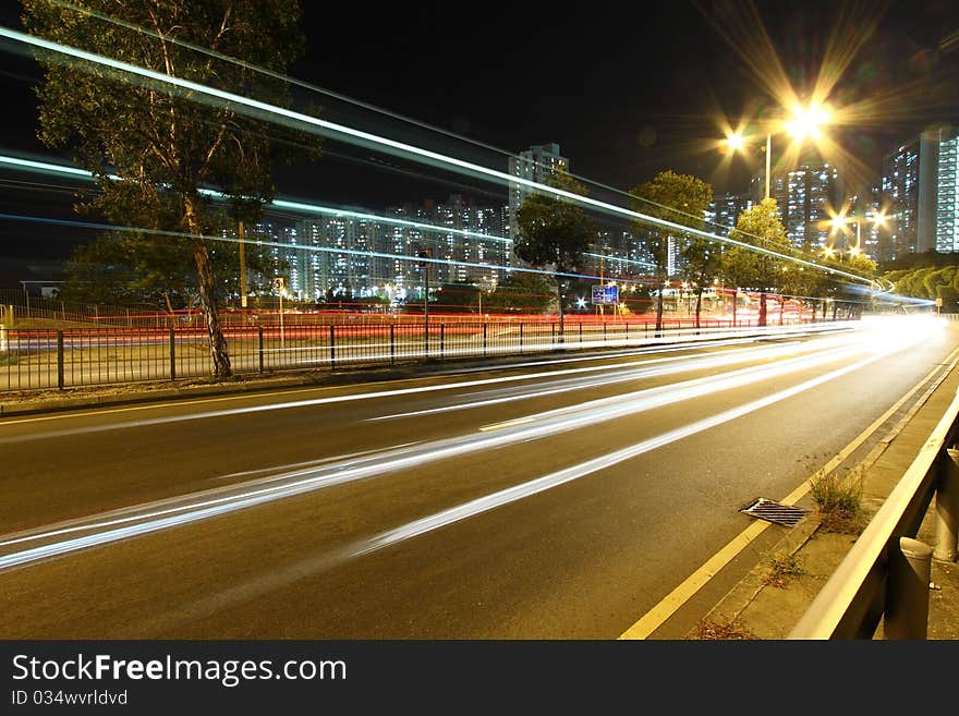 Busy traffic in downtown of Tuen Mun, Hong Kong, show the bright side of Hong Kong - Pearl of the East. Busy traffic in downtown of Tuen Mun, Hong Kong, show the bright side of Hong Kong - Pearl of the East.