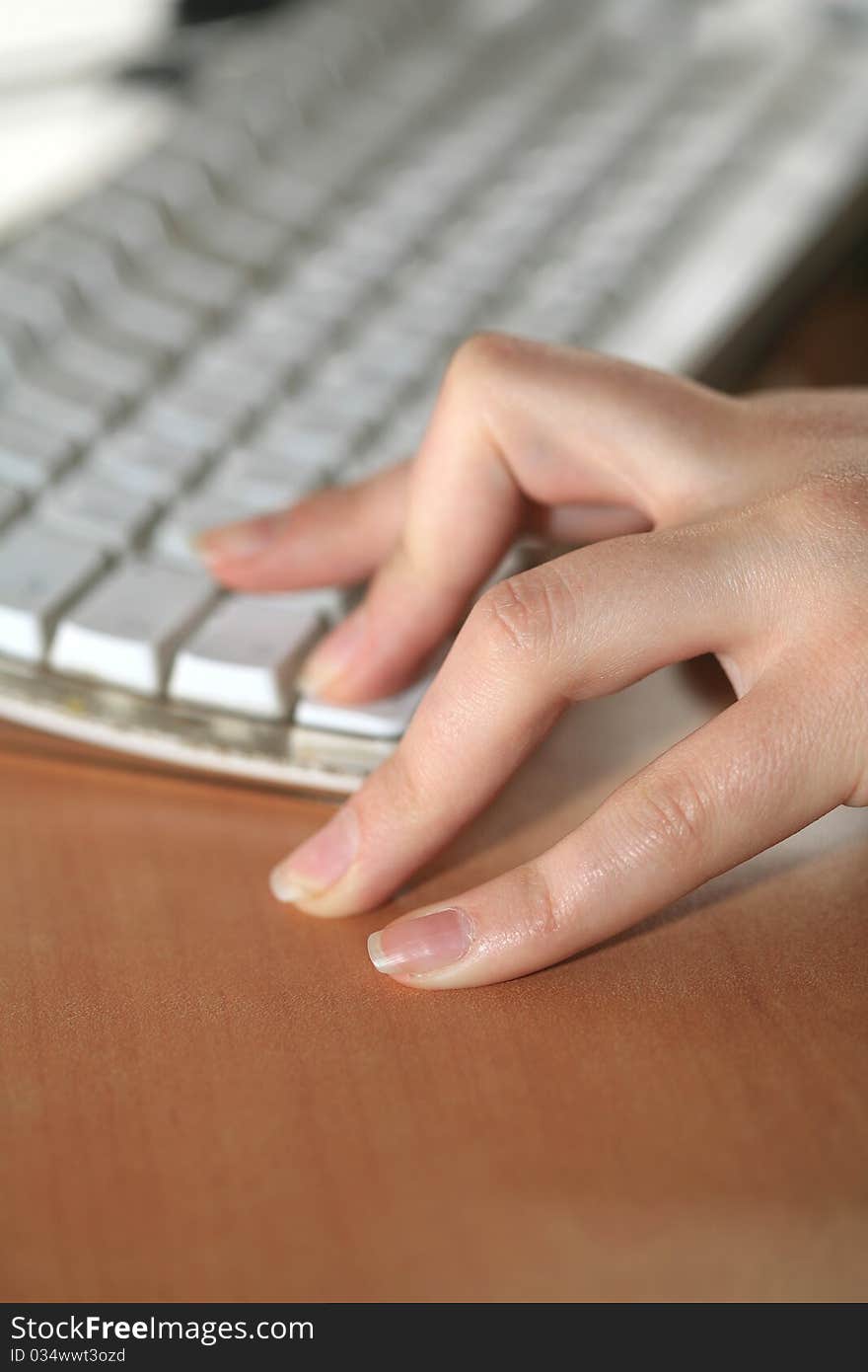 Image of human hands pressing keys of compuer. Image of human hands pressing keys of compuer