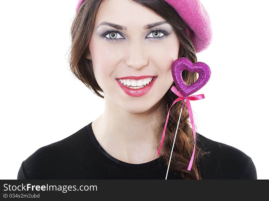 Beautiful smiling woman with heart on white background