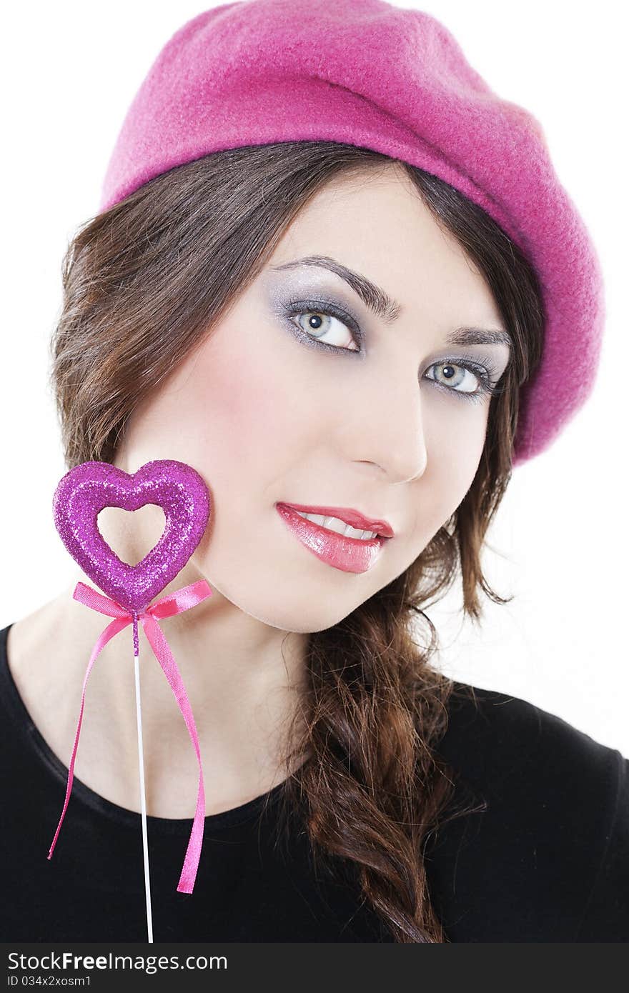 Beautiful smiling woman with heart on white background