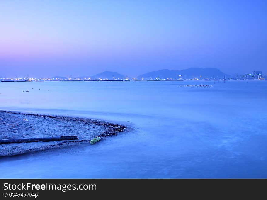 Sunset Under Long Exposure Along Seashore