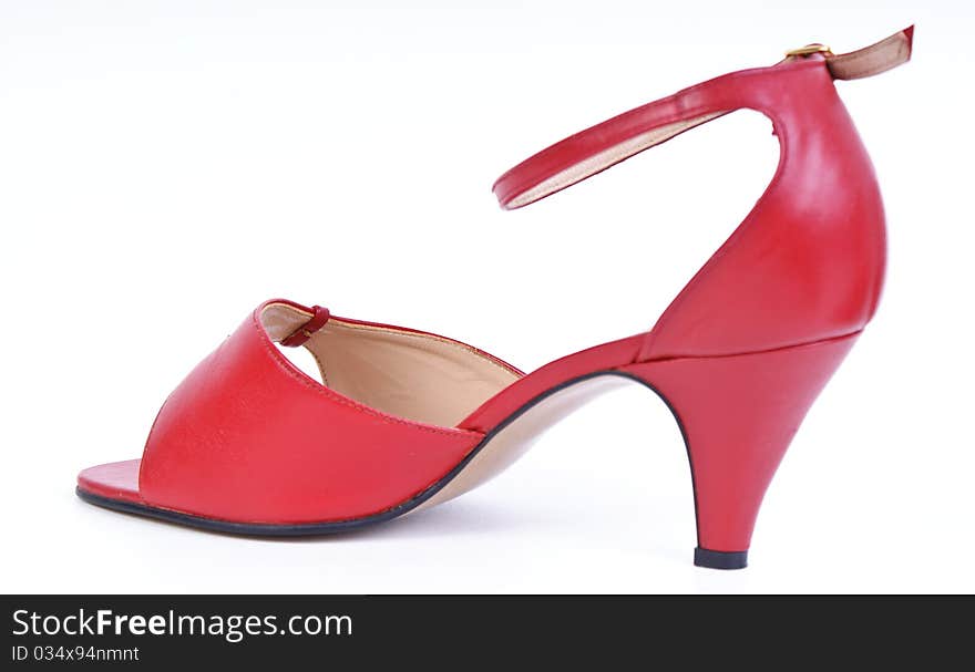 Elegant red womans shoes on white. Elegant red womans shoes on white