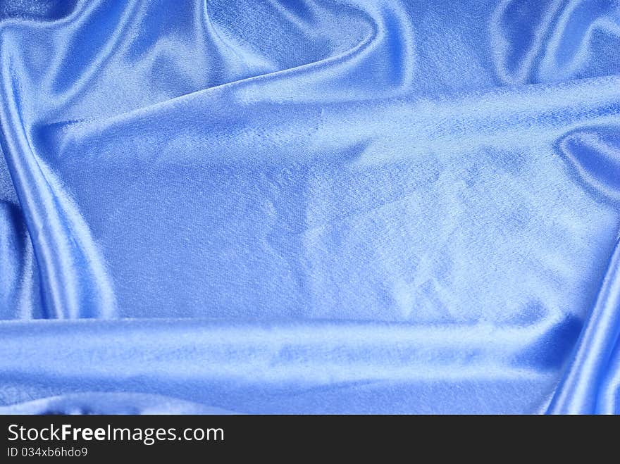 Blue silk textile abstract background