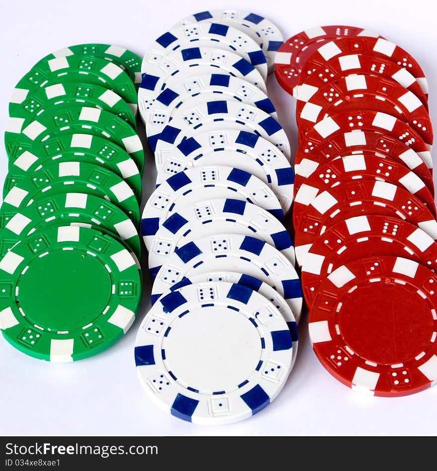 Photography of three line chips colored green white and red. Photography of three line chips colored green white and red