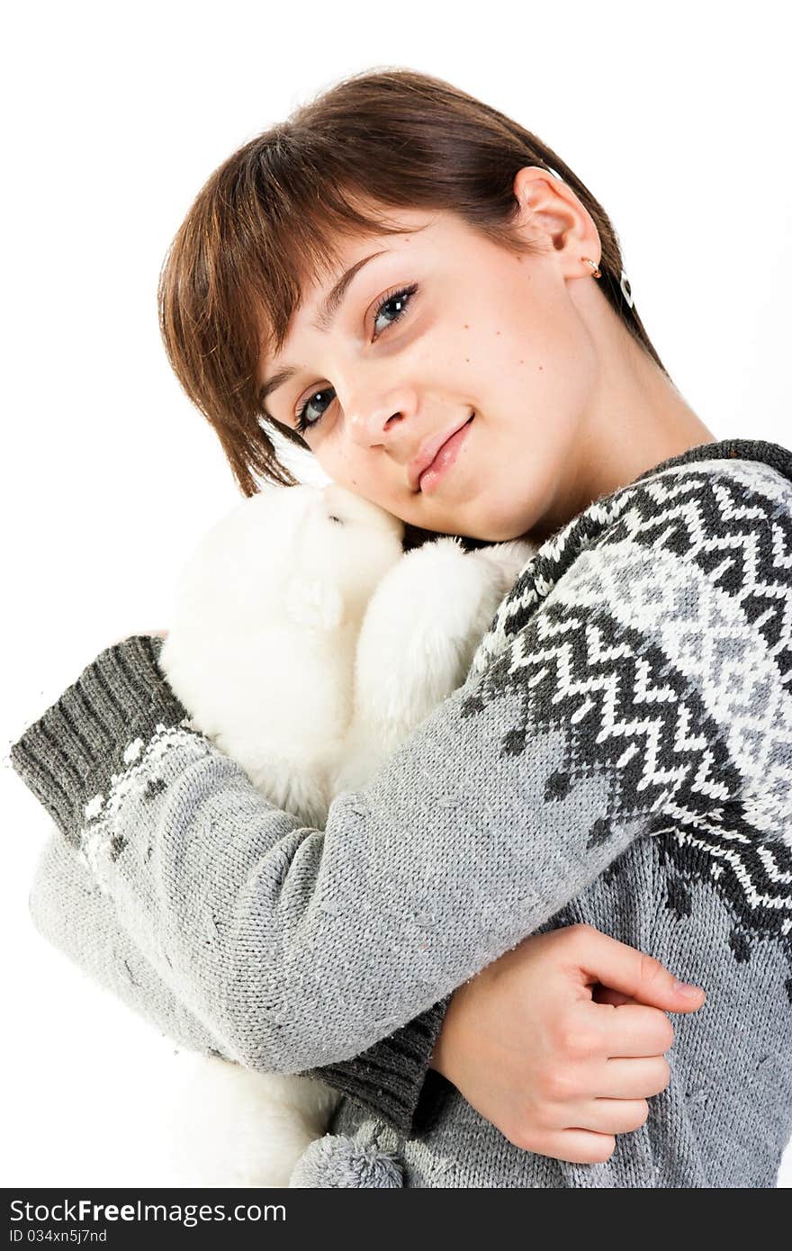 Portrait of a beautiful girl with toy