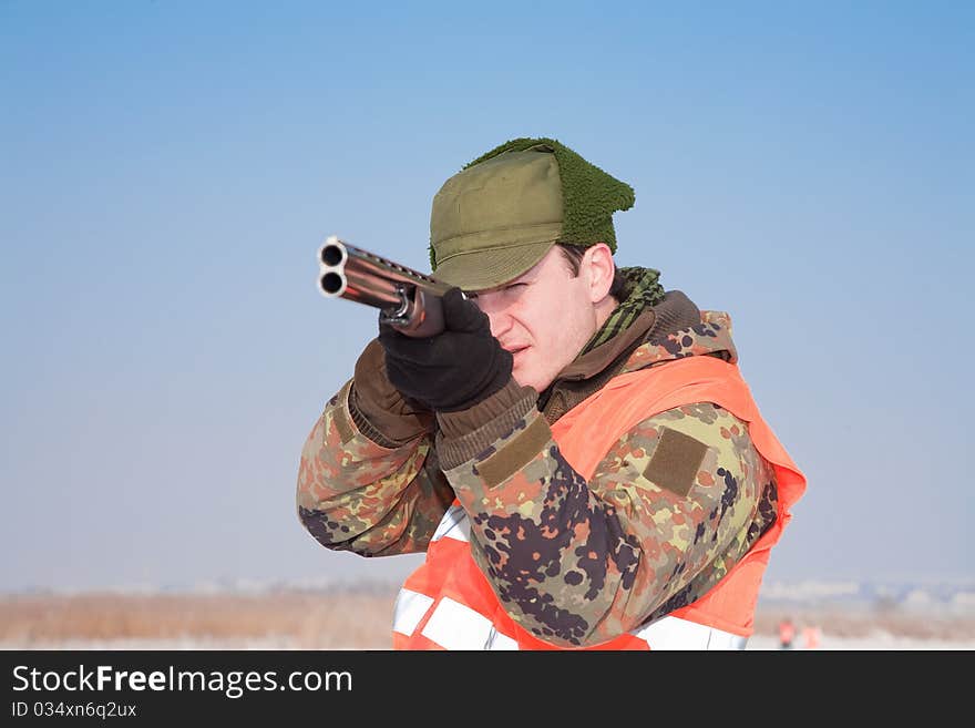 Hunter aiming at the hunt. Hunter aiming at the hunt.